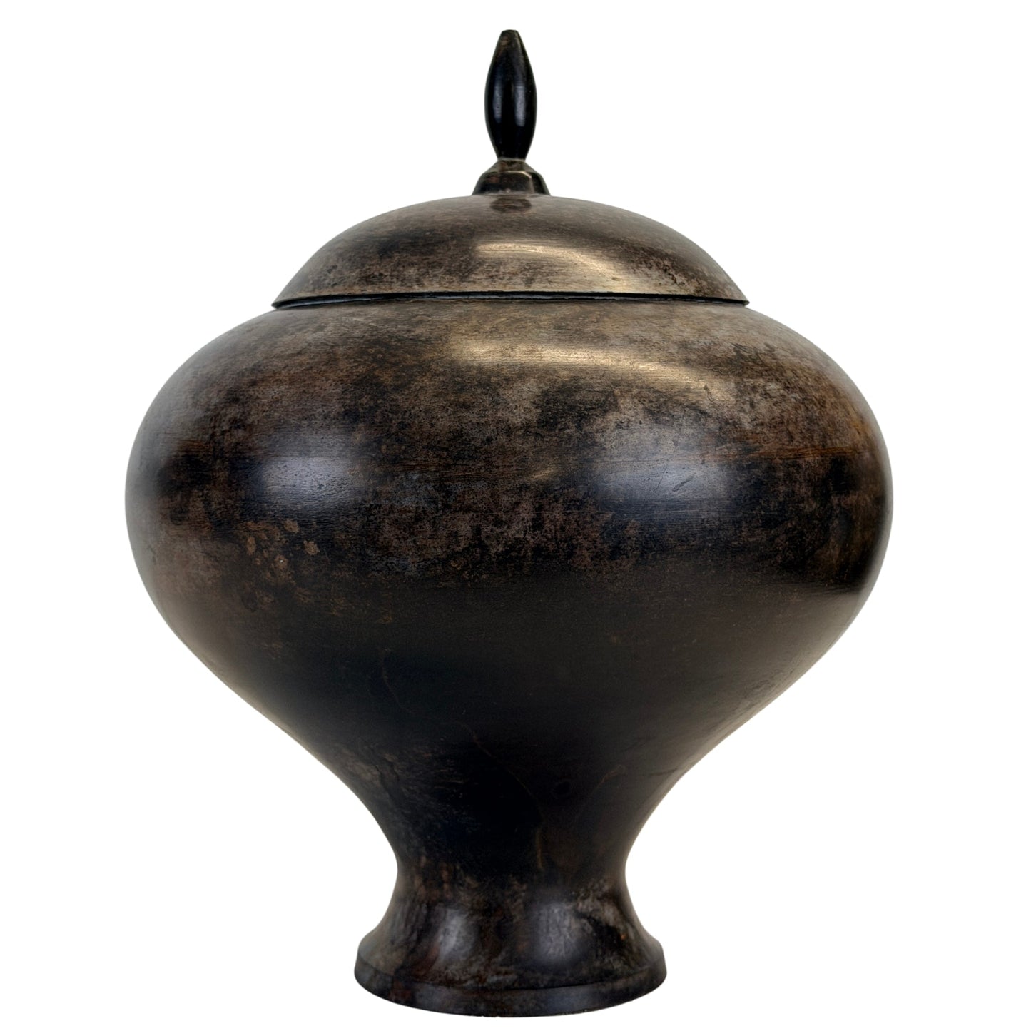 Indian bronze covered vessel A with rounded form, dark patina and lotus bud finial
