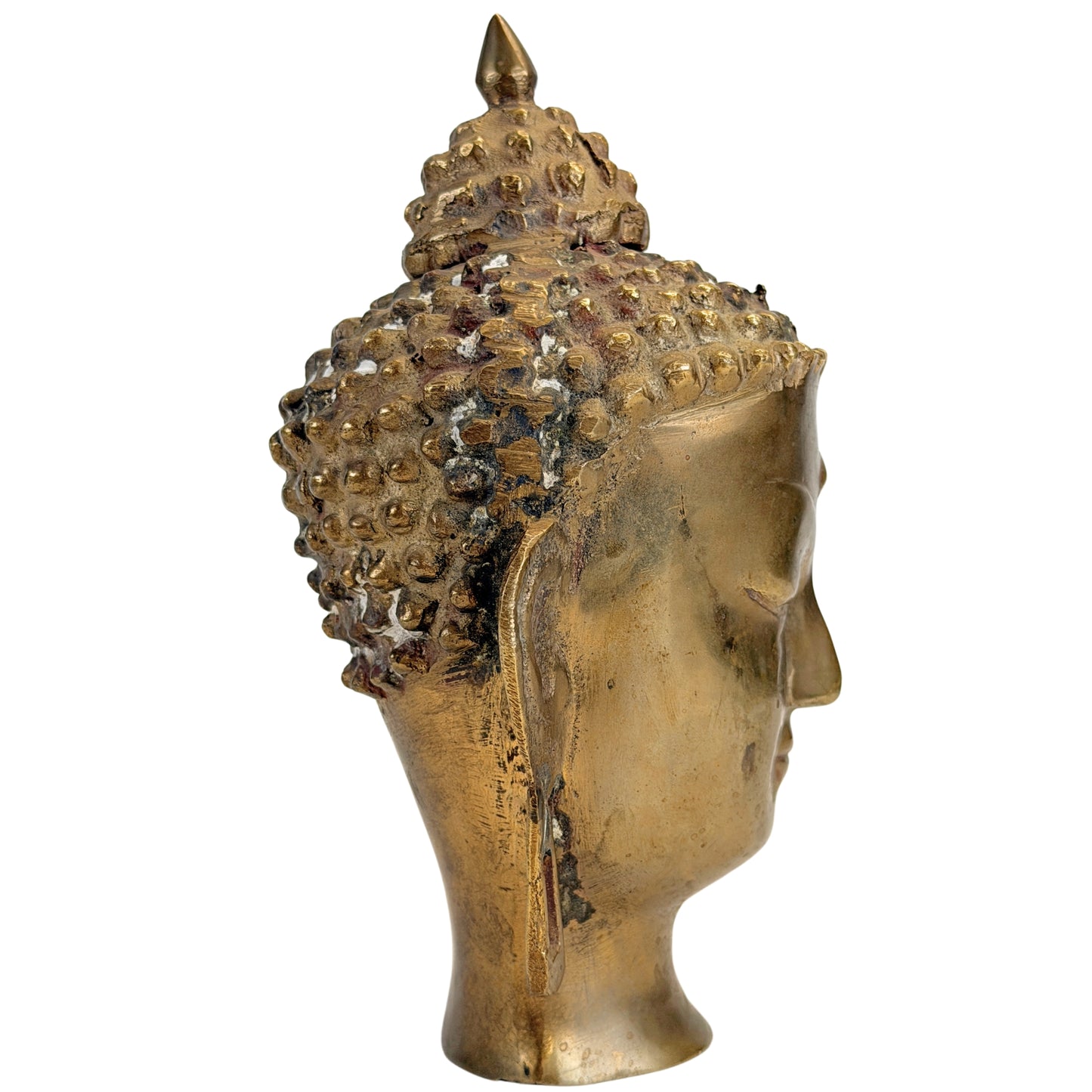 Profil droit de la tête de Bouddha avec long lobe d’oreille ajouré