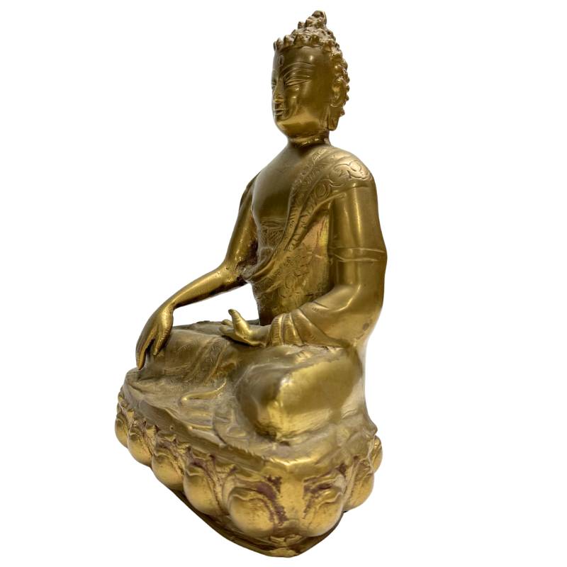 Handmade spiritual Buddha statue from the Nepal and Tibet region made of heavy-quality bronze.