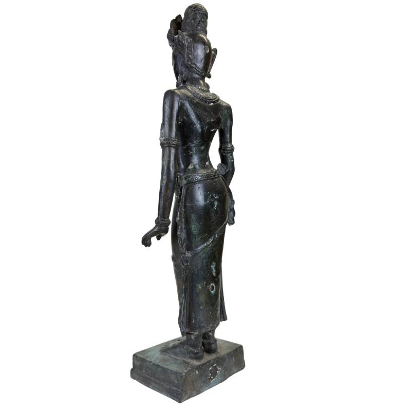 Spiritual bronze statue from Asian art with a calm appearance