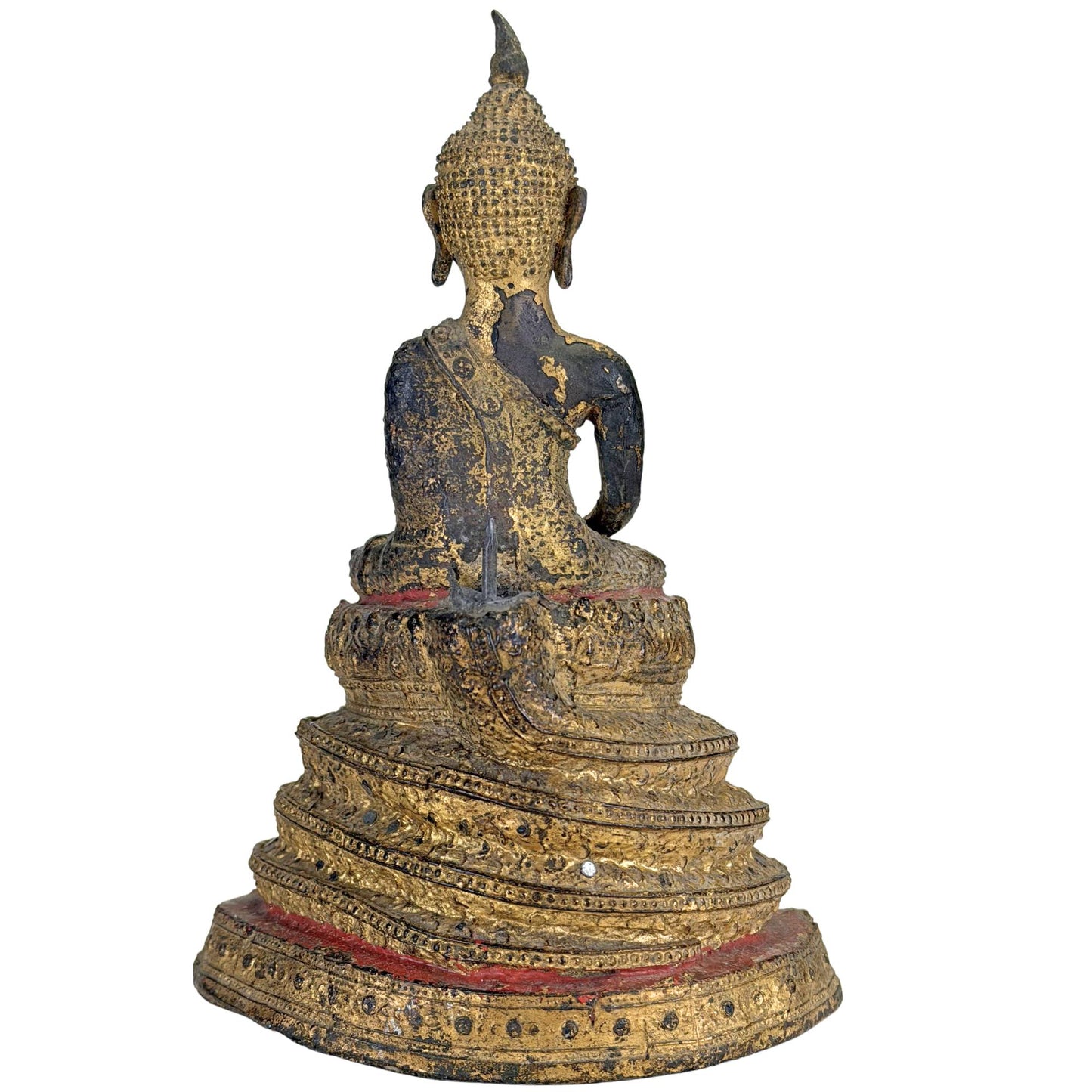 Spiritual Thai Buddha statue with protective Naga snake and temple base