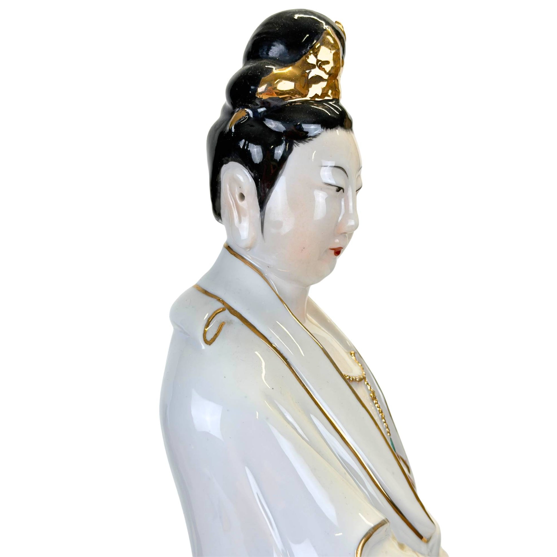 Large porcelain statue suitable for a spiritual altar or sideboard.