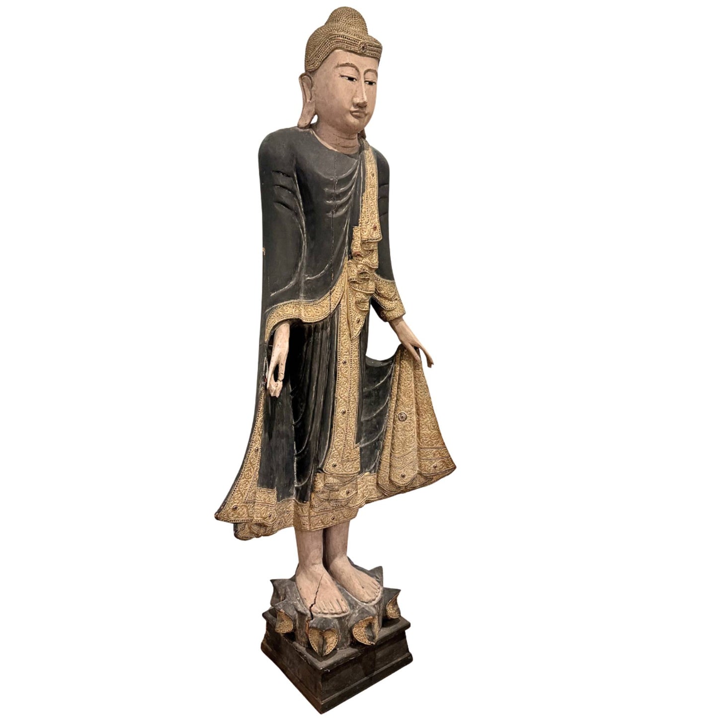 Standing Buddha from Myanmar with inlaid eyes, antique wooden statue with a serene appearance and refined finish