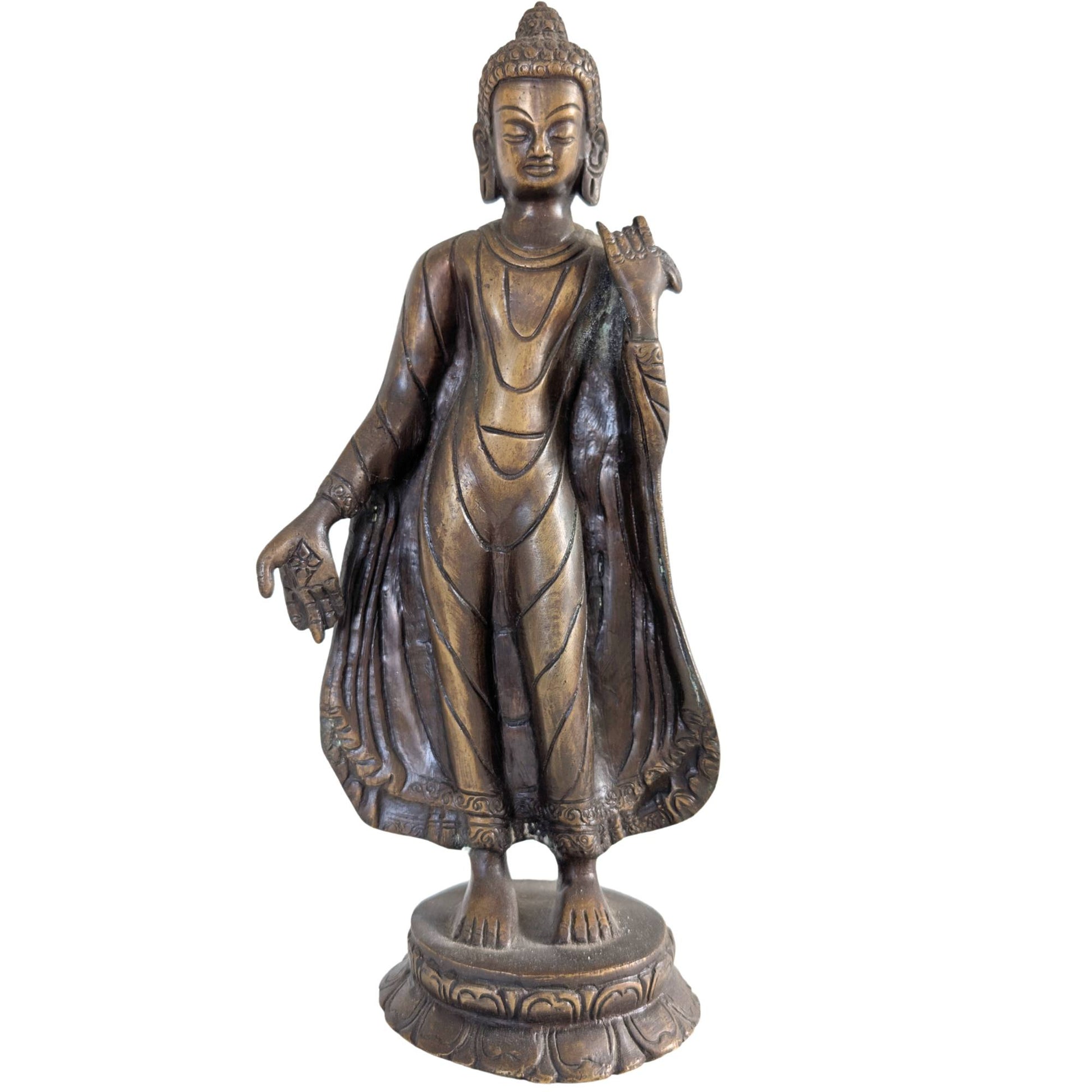 Front view of a 27.5 cm high bronze statue of the standing Buddha from Nepal.