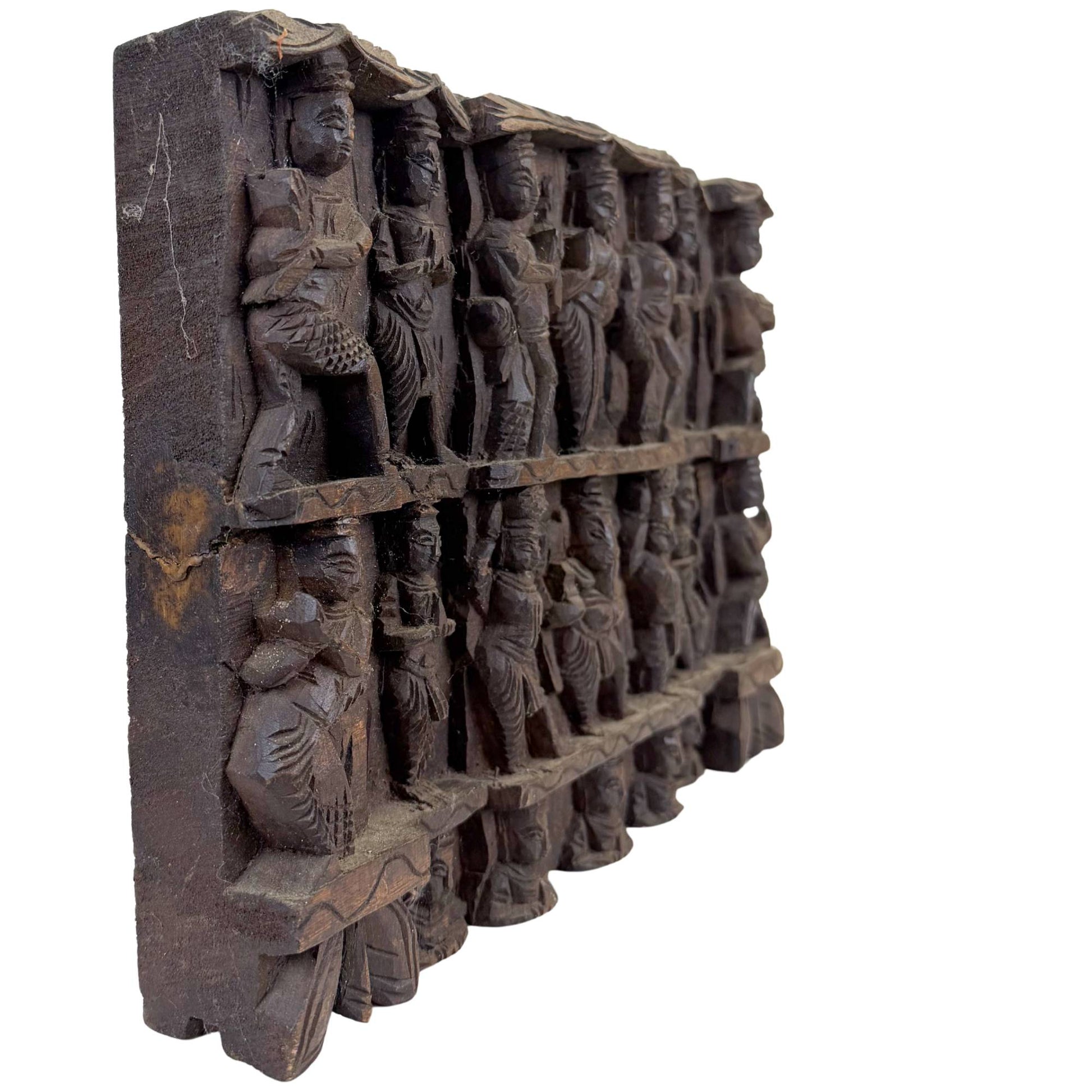 Close-up of the corner of the temple frieze with the weathered wood structure and authentic weathered patina.