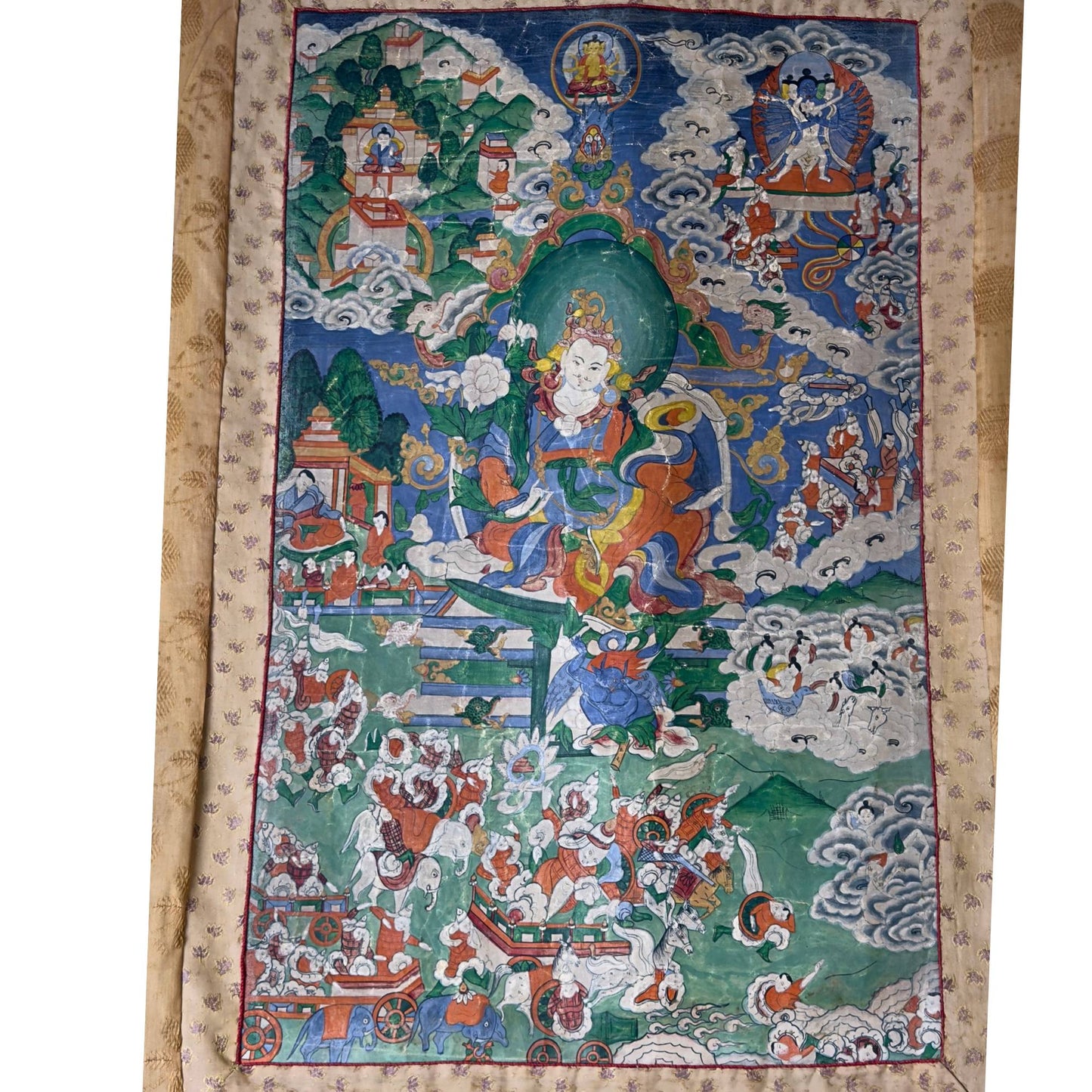 Detail of a blue Tantric deity in Yab-Yum union, painted with authentic mineral pigments.
