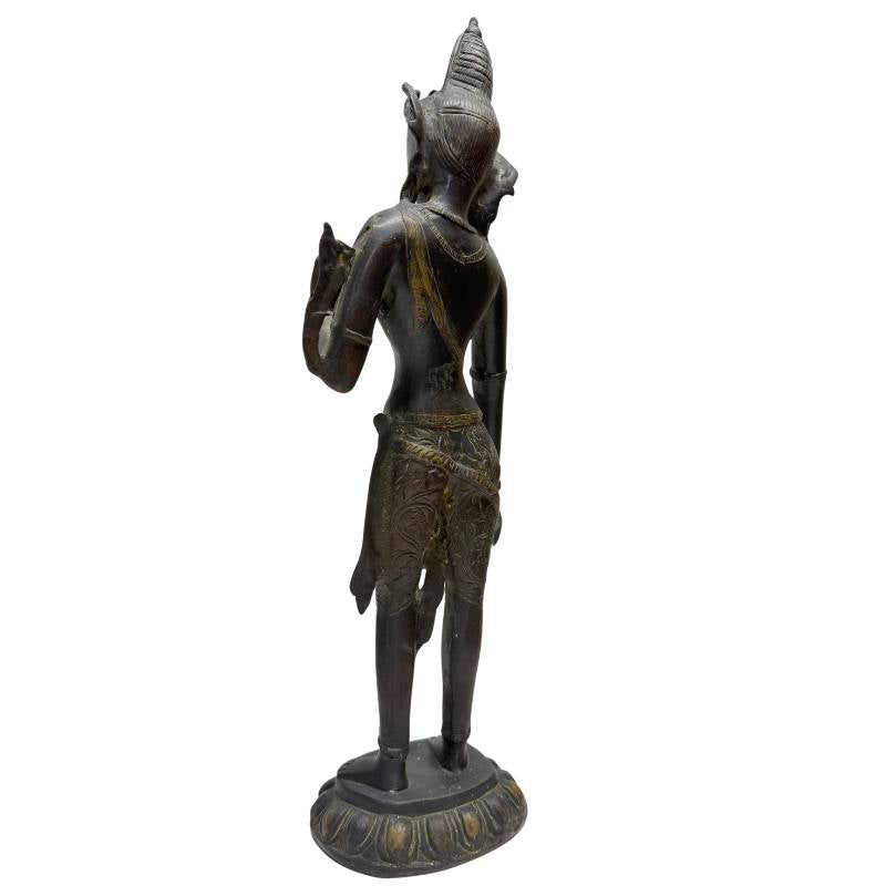 Side view of the standing Tara with visible antique patina.