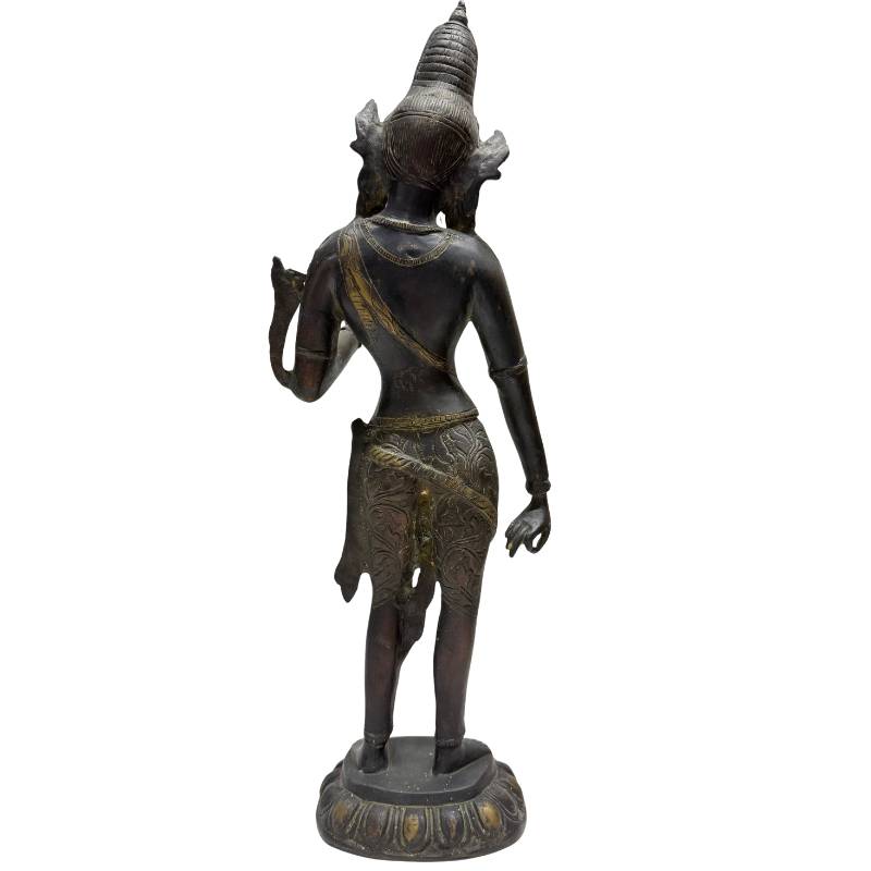 Front view of a standing Tara statue in bronze with visible patina and signs of use