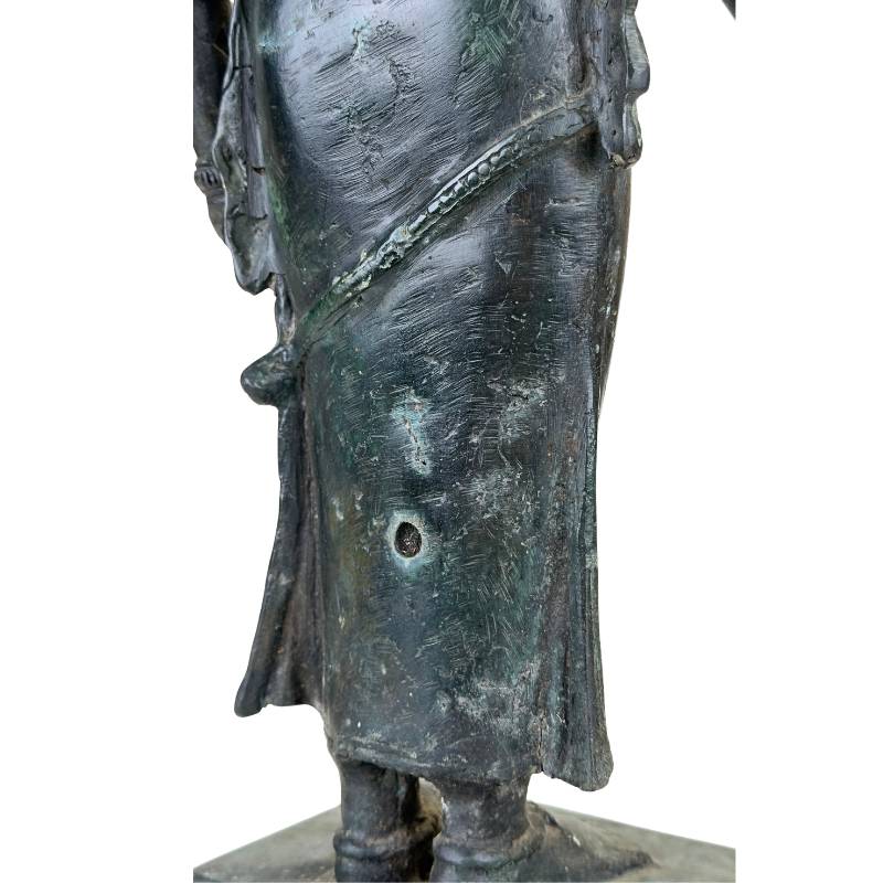 Bronze temple statue from Asian art with patina