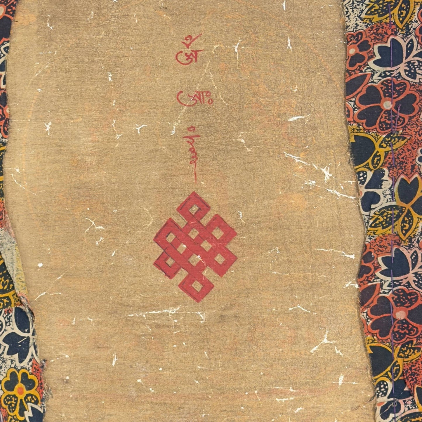 Forensic textile examination of the thangka showing the canvas, the red ink, and the machine-made floral fabric.