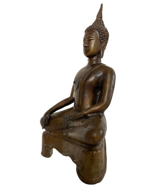 Thai bronze Buddha seated in Bhumisparsha posture with a peaceful expression