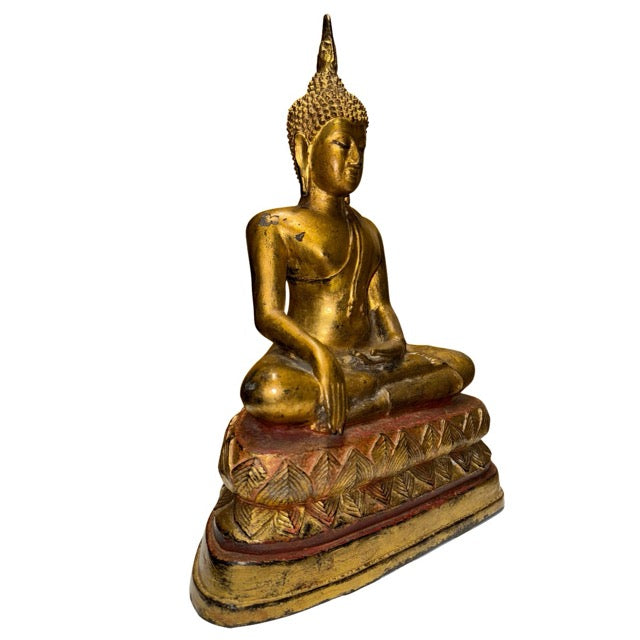 Thai Buddha in Bhumisparsha mudra as a symbol of grounding, protection, and enlightenment