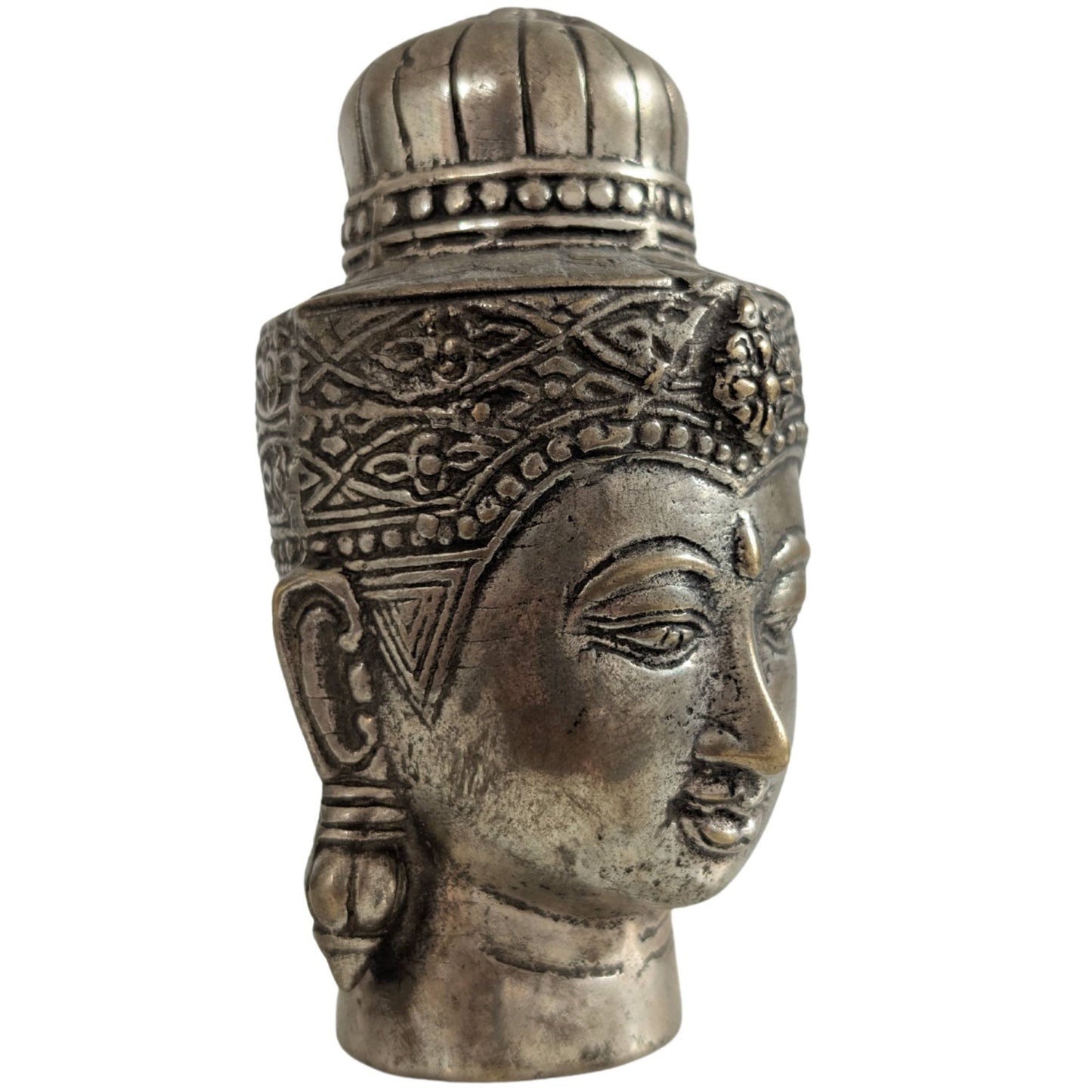 Three-quarter view of the Buddha head with a focus on the serene facial features.