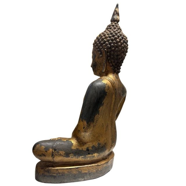 Thai Buddha statue with remnants of old gilding