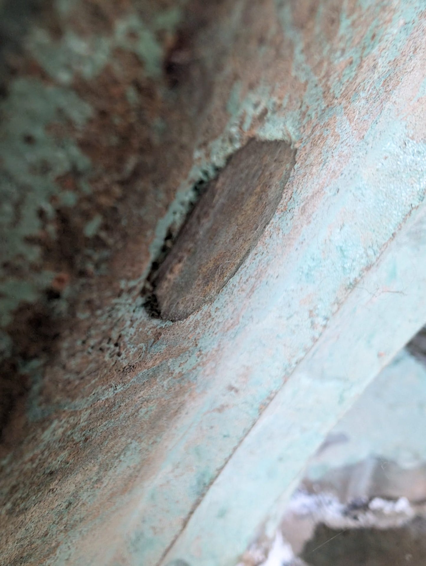 Thai Buddha statue with visible remnants of paint and gilding