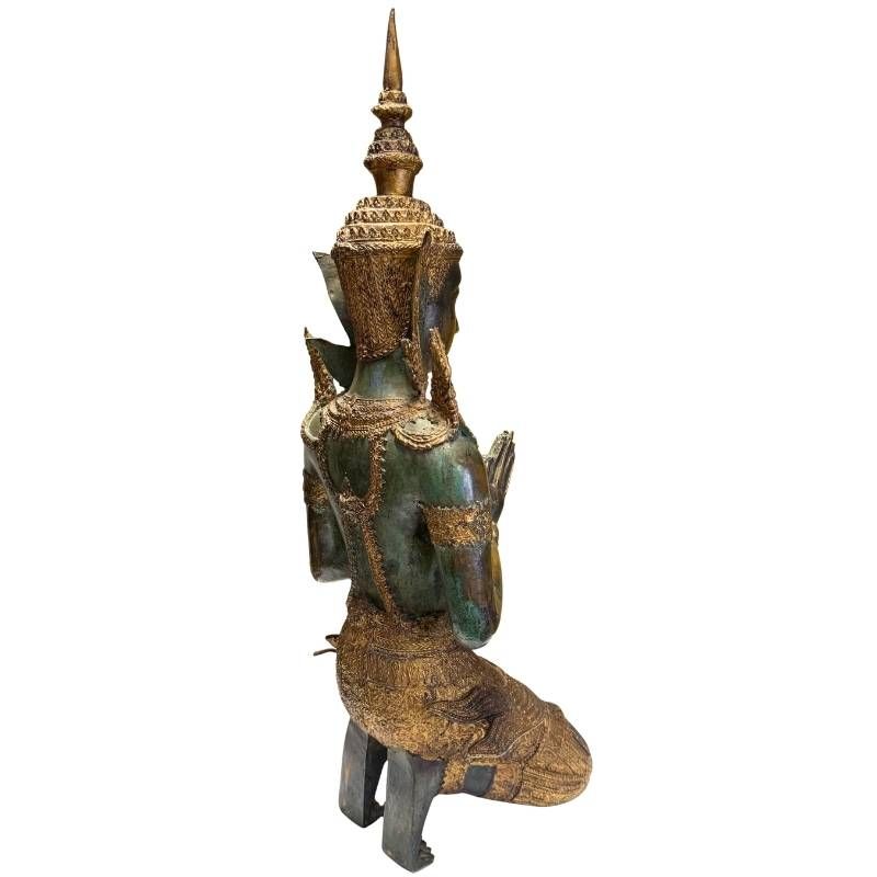 Antique Thai bronze temple guardians as protective figures for the interior
