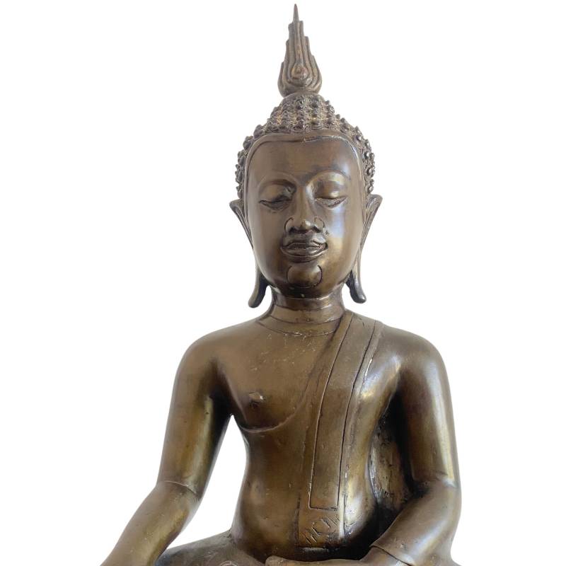Thai bronze Buddha in bhumisparsha mudra with a serene appearance