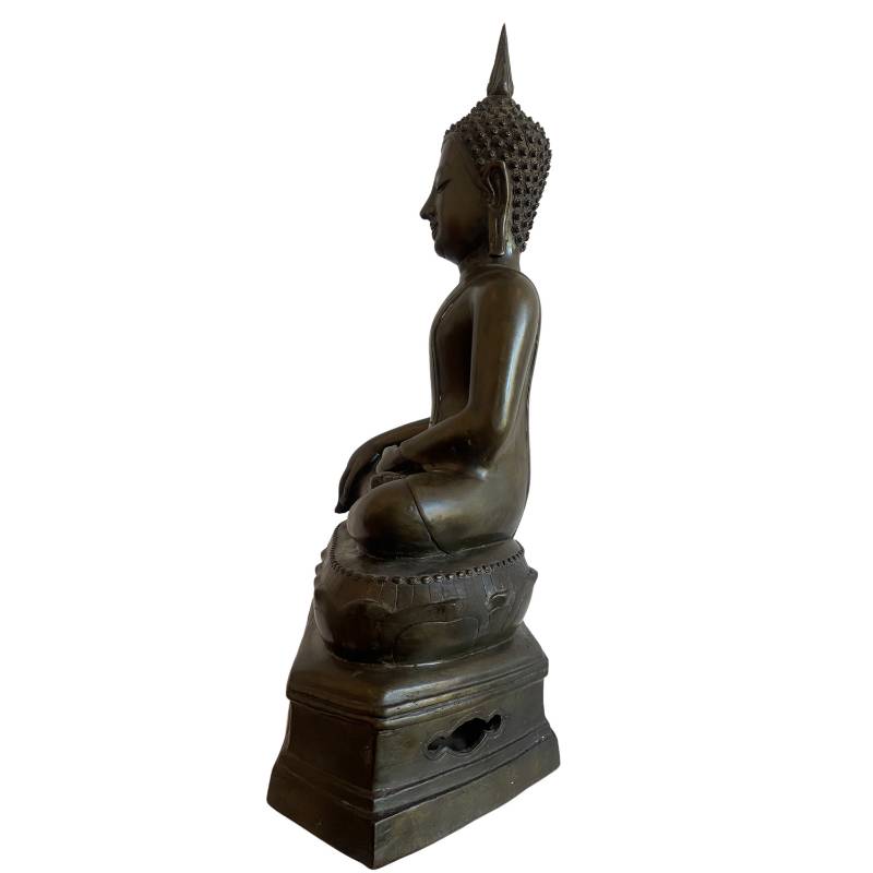 Thai bronze Buddha in bhumisparsha mudra with a temple appearance