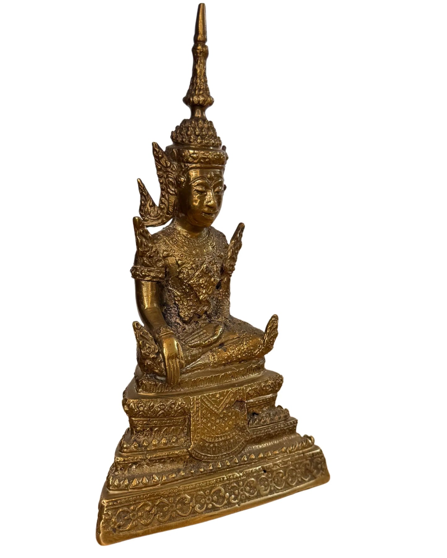 Detail of crown and ornaments of Thai Buddha in bronze with refined finish