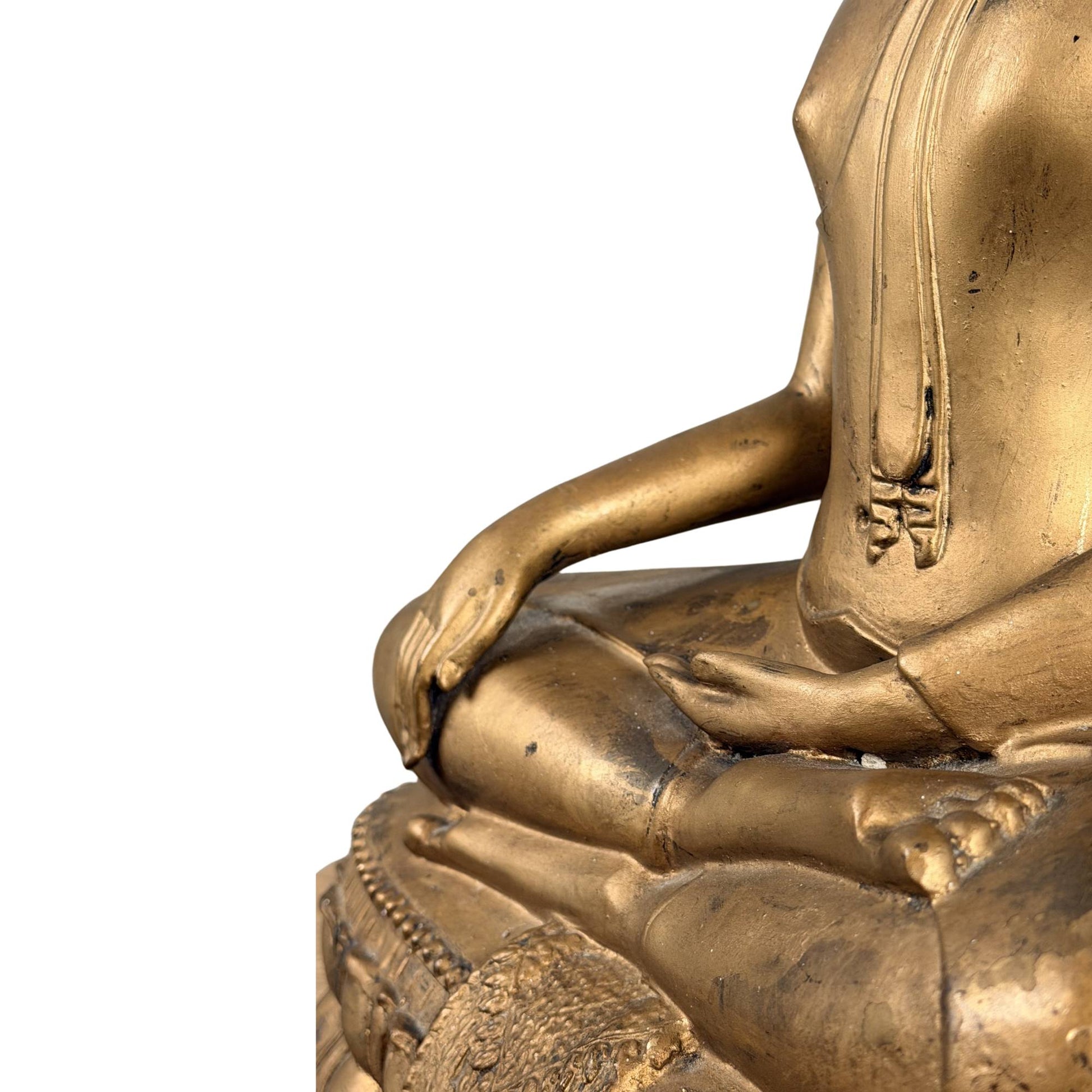 Thai Buddha with antique gold color and powerful serene presence