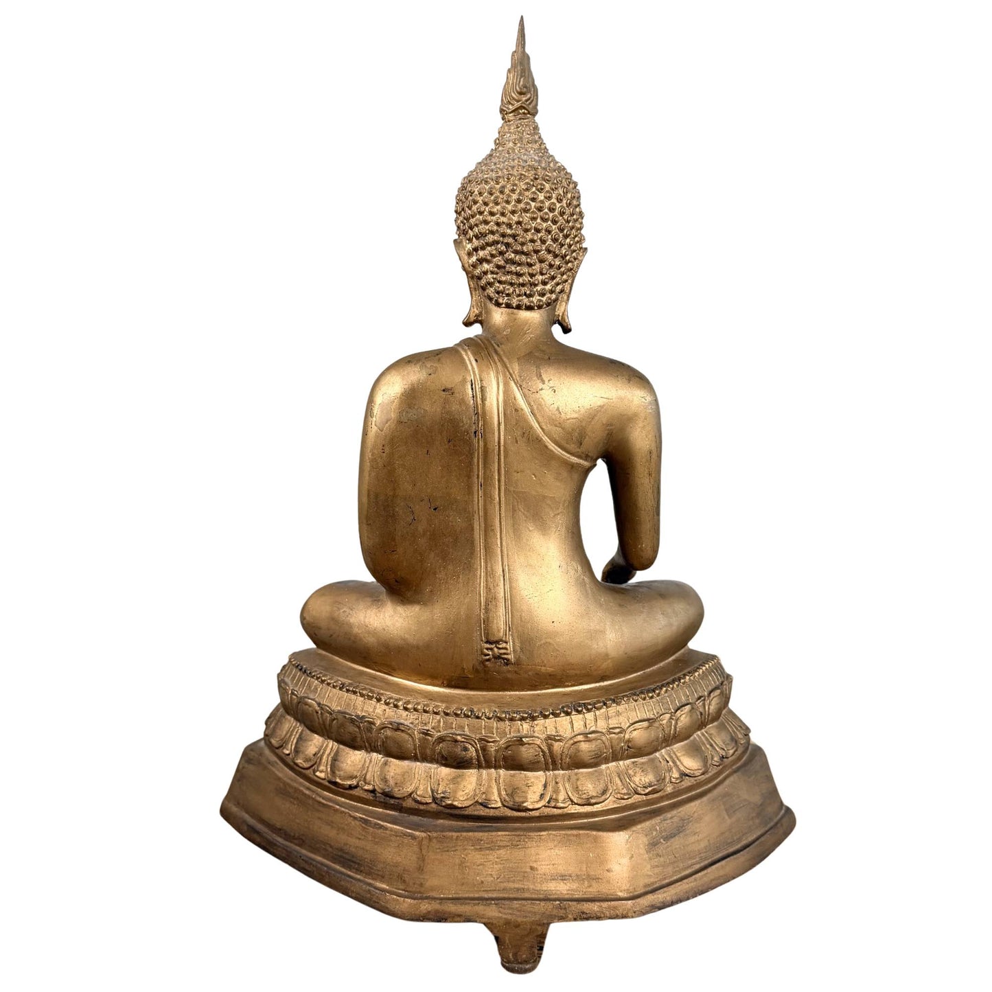 Thai meditating Buddha with gold-colored finish and spiritual appearance