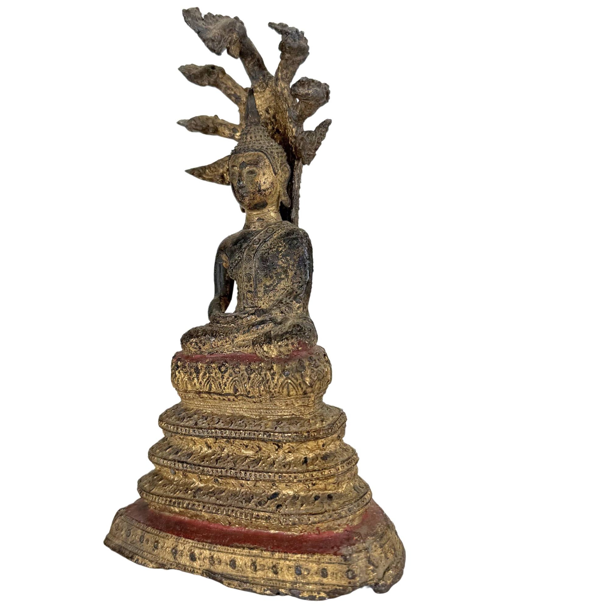 Thai meditation Buddha with multi-headed Naga crown and gilded details