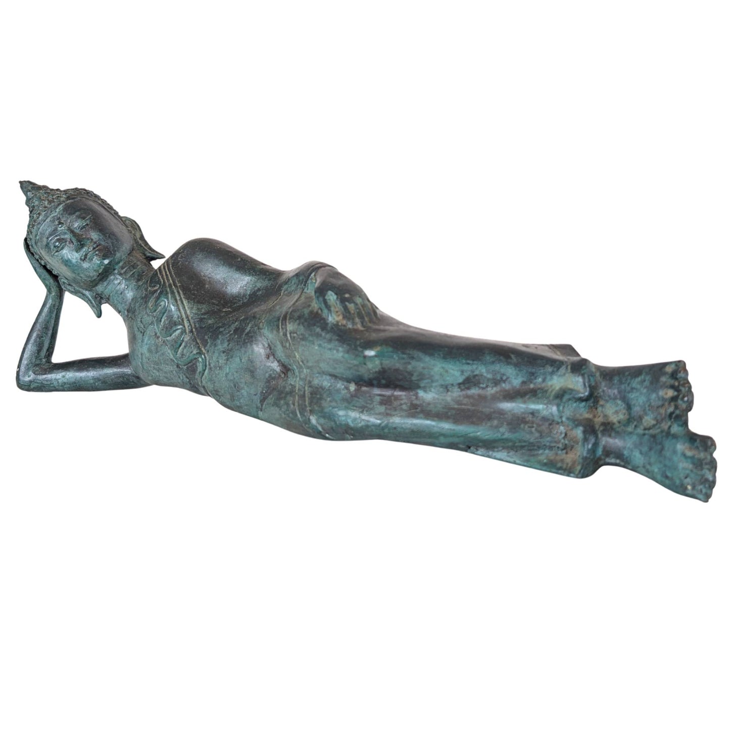 Detail of the head of a reclining Thai Buddha with a serene facial expression and old patina