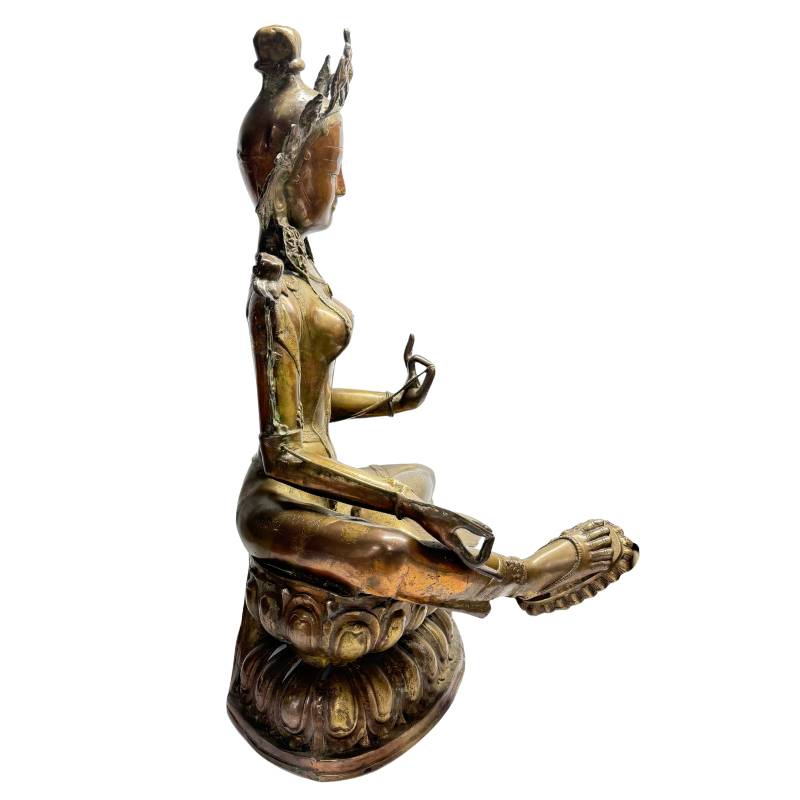 Monastic Tibetan Tara statue in fire-gilded bronze