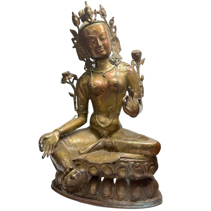 Antique Tibetan Tara statue in fire-gilded bronze with lotus base