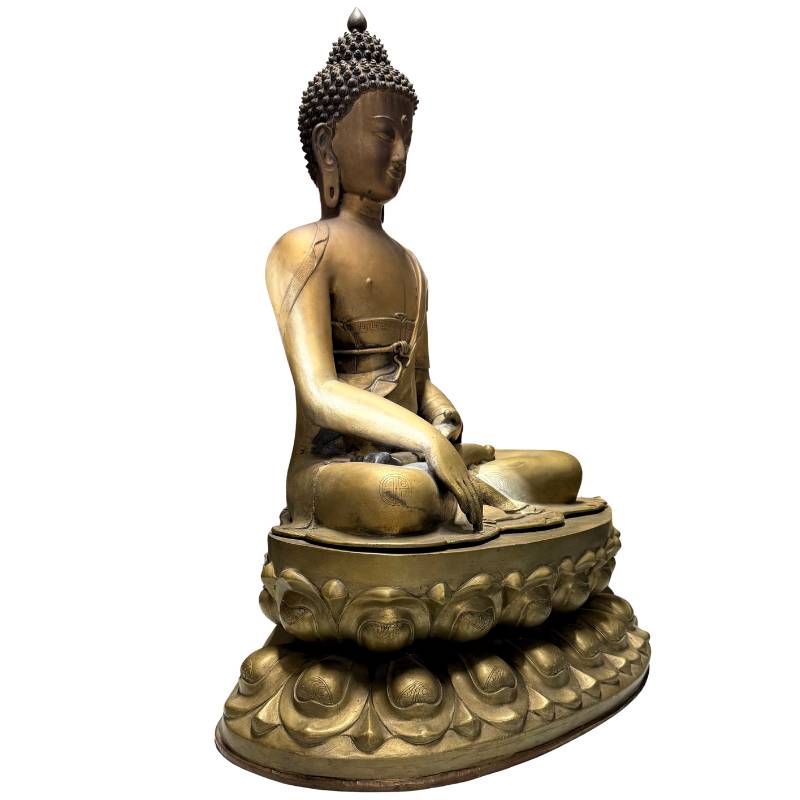 Tibetan bronze Buddha statue, fire-gilded with lotus base and wear