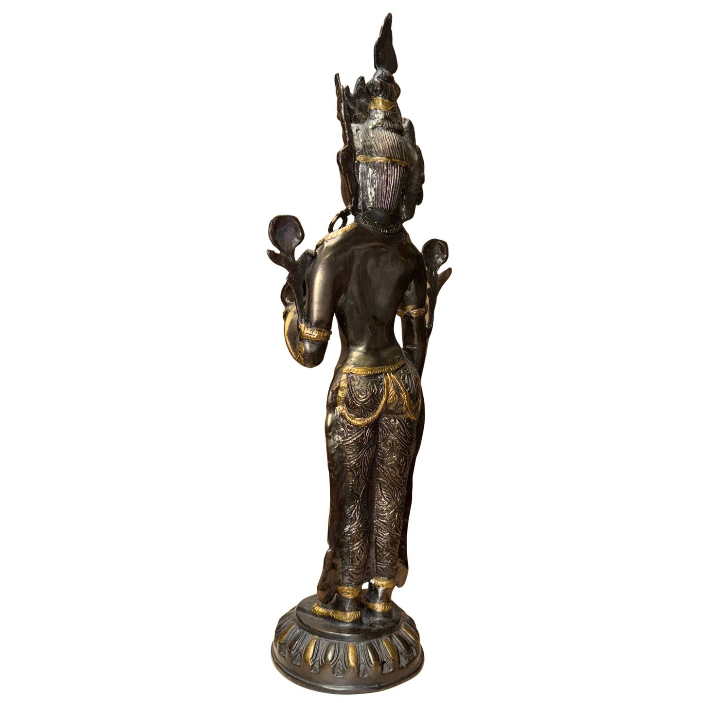 Tibetan bronze Tara with dark patina and antique gold accents in the details