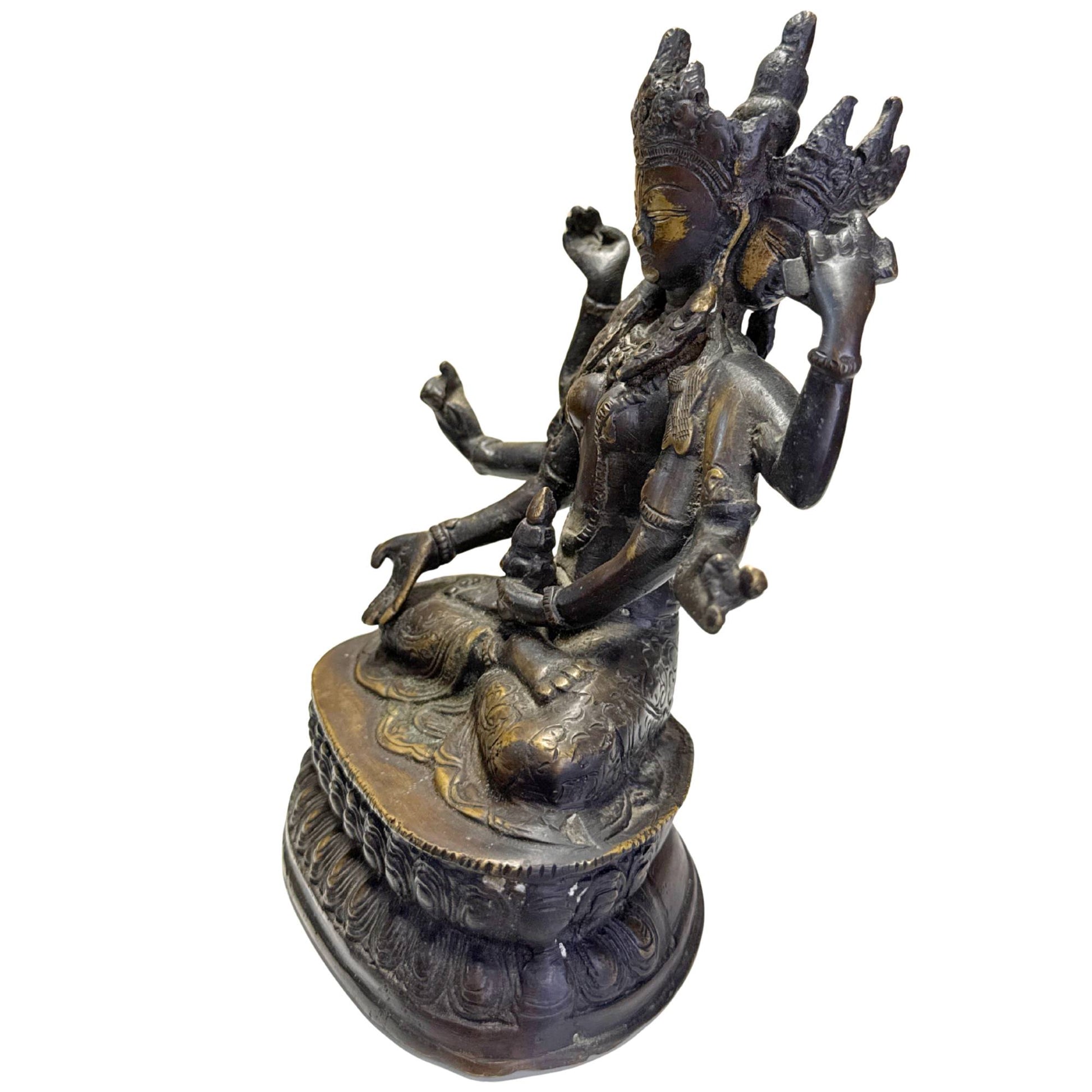 Tibetan longevity goddess Ushnishavijaya with gilded face and dark patina