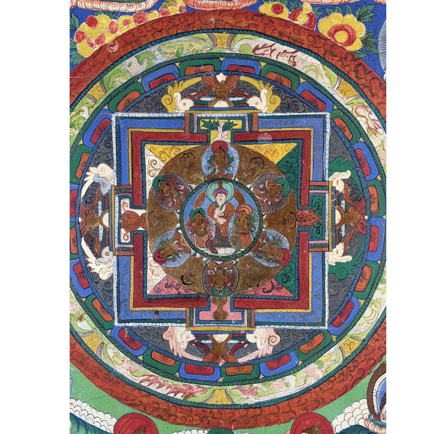 Tibetan mandala thangka with refined gold accents and traditional composition