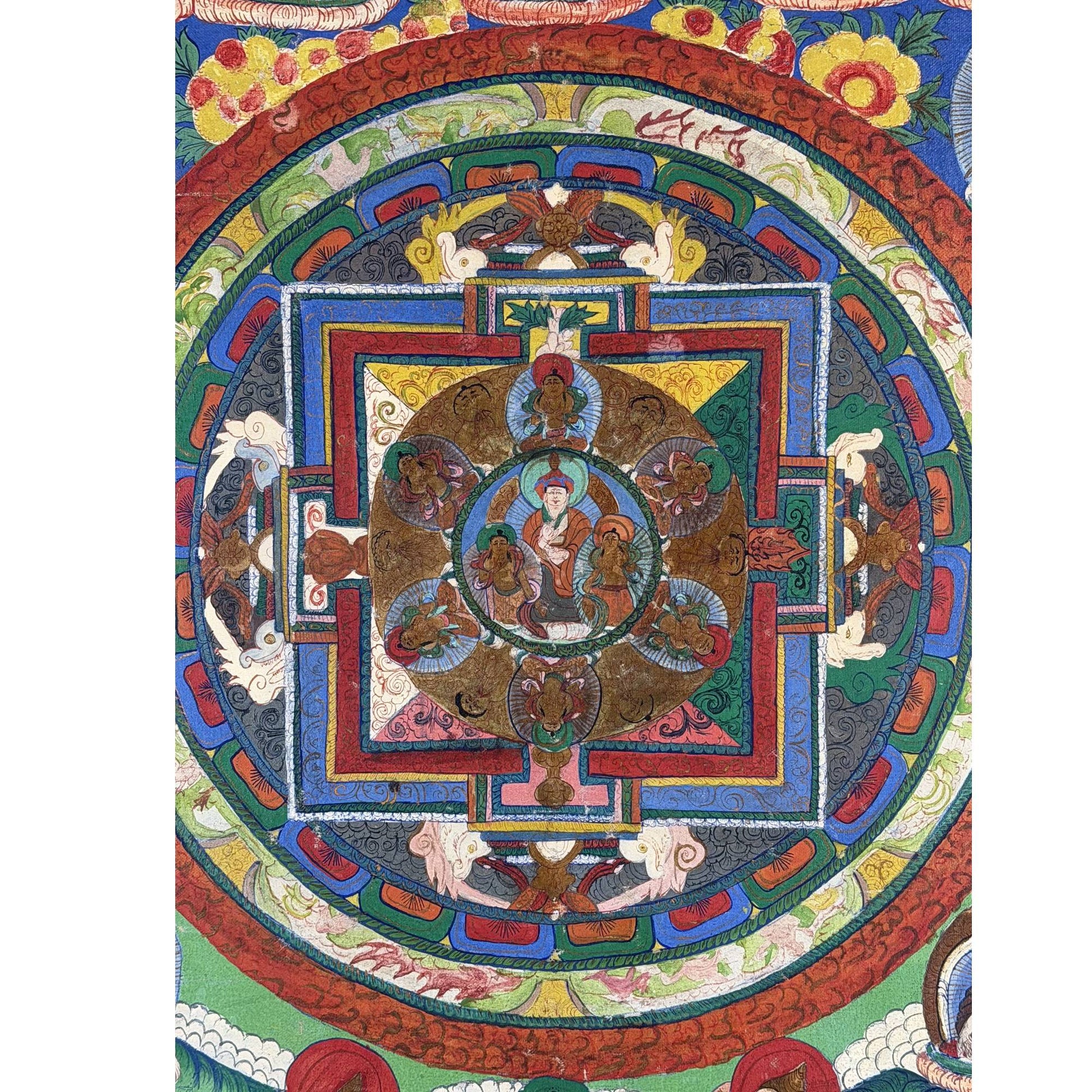 Tibetan mandala thangka with refined gold accents and traditional composition