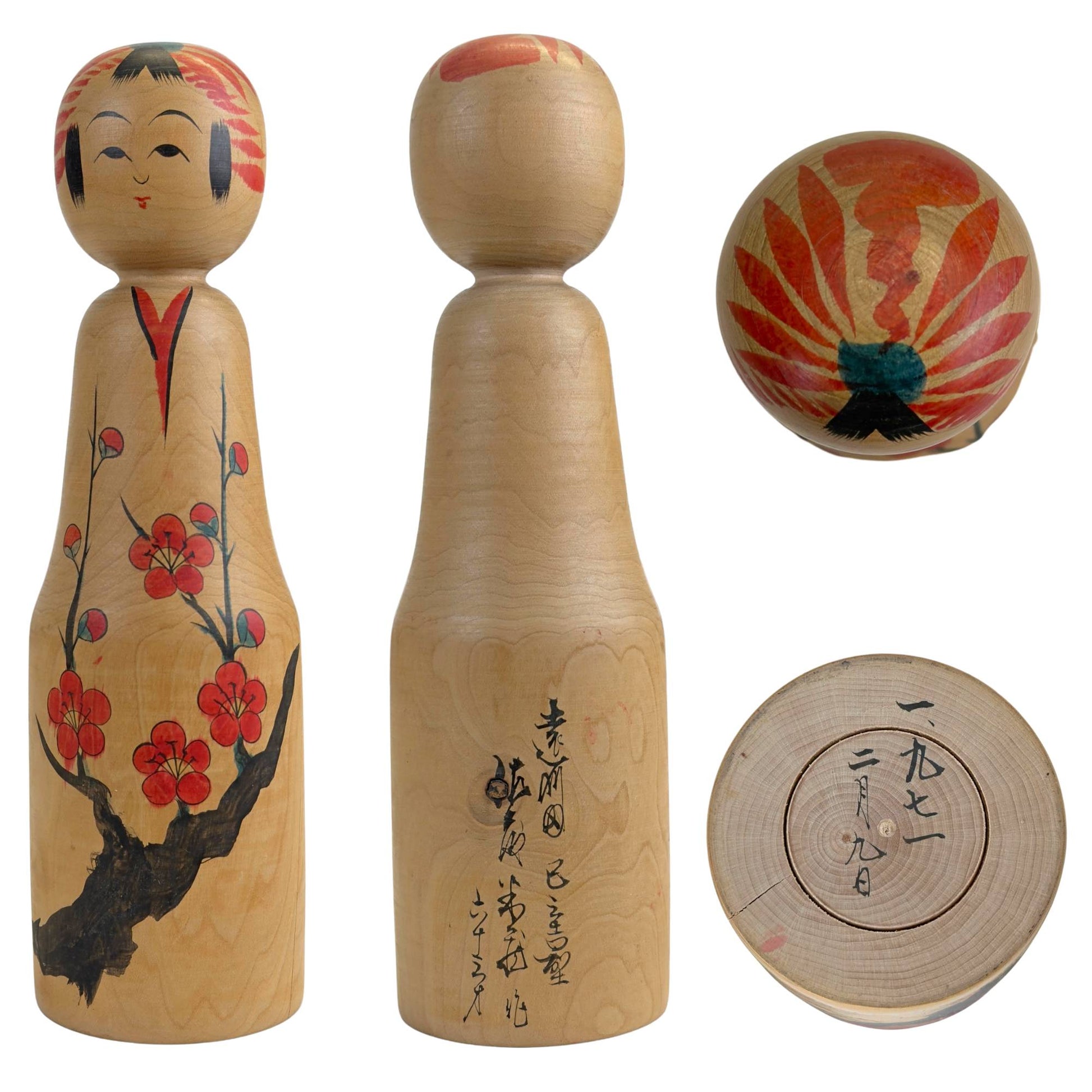 Togatta Kokeshi by Yoshio Ogasawara with plum blossom motif