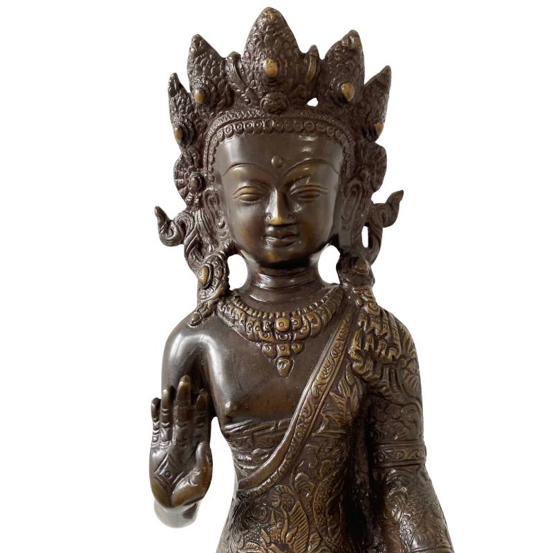 Traditional Dipankara Buddha statue in bronze