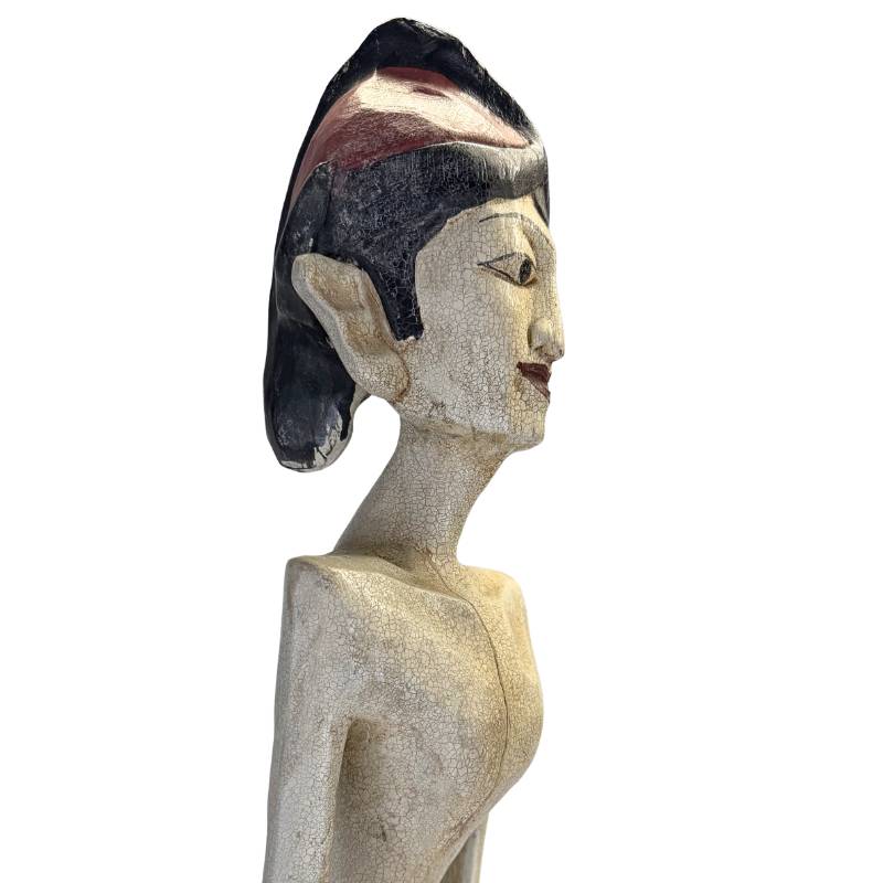 Detail of the male figure with a traditional Javanese Blangkon.