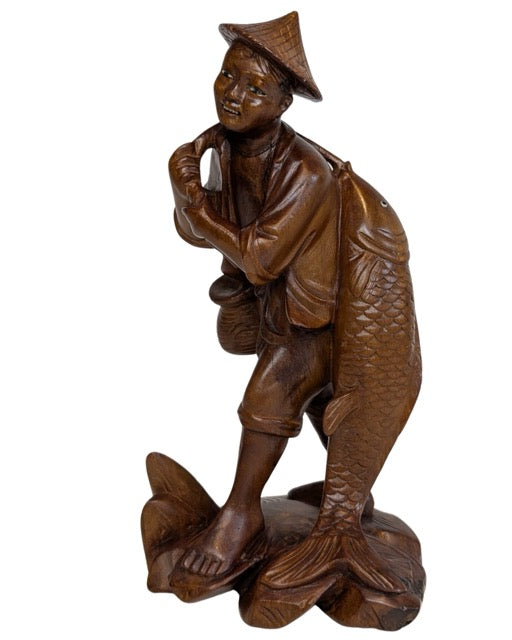 Traditional Chinese fisherman sculpture symbol of prosperity