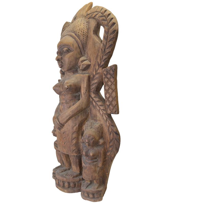 Tribal African wooden sculpture with handcrafted details