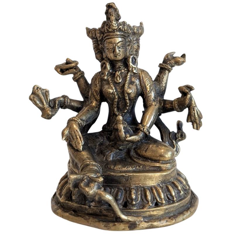 Buddhist statue of Ushnishavijaya in a meditative sitting posture