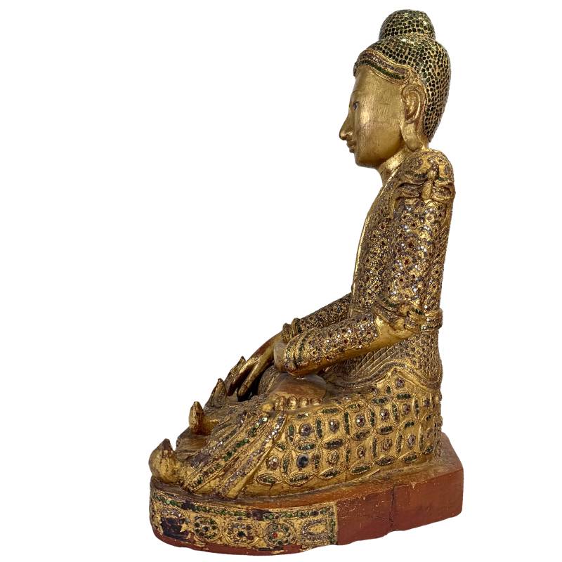 gilded Buddha statue, manual finish, visible wear details