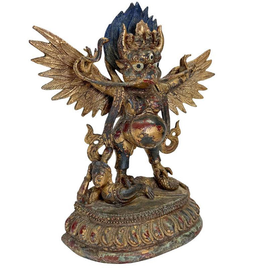 Gilded bronze Garuda figure from Himalayan art with polychrome details