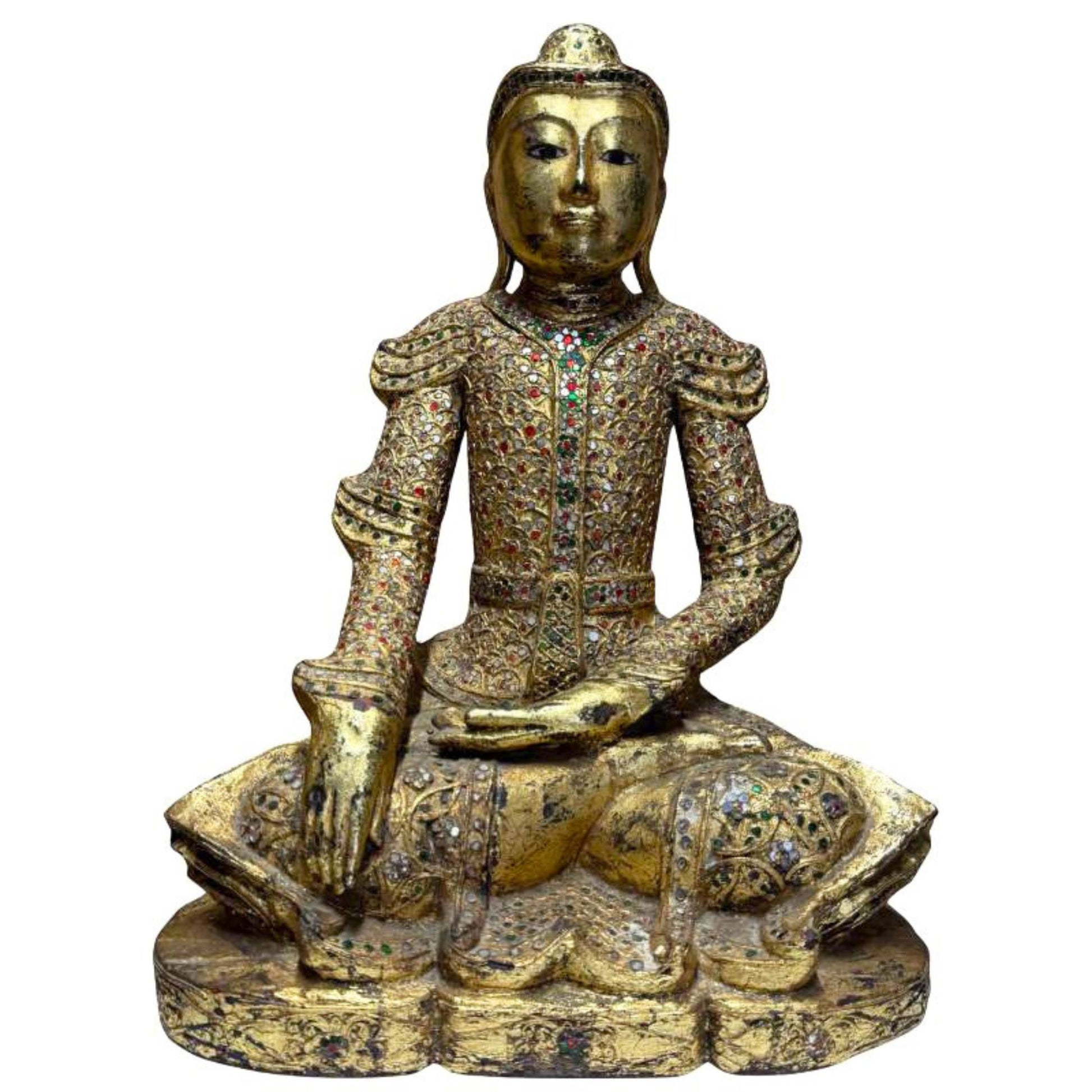 Gilded Mandalay Buddha statue from Myanmar as a symbol of grounding, protection, and enlightenment