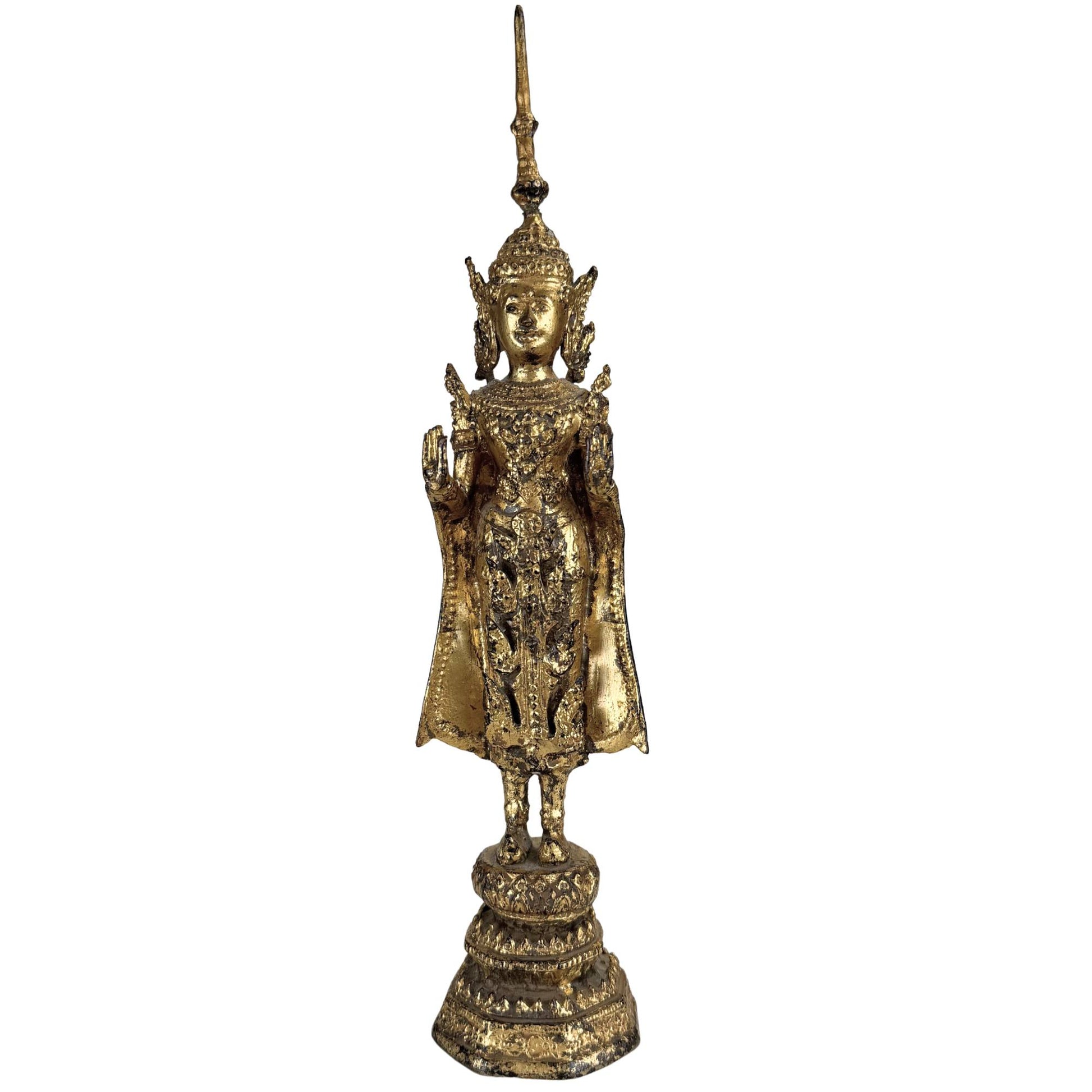 Gilded Thai Buddha statue in classic Rattanakosin style with a royal appearance