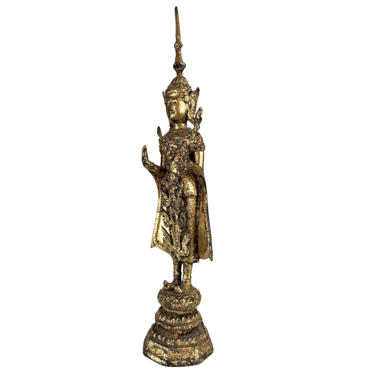 Gilded Thai Buddha on a traditional lotus base with elegant vertical design