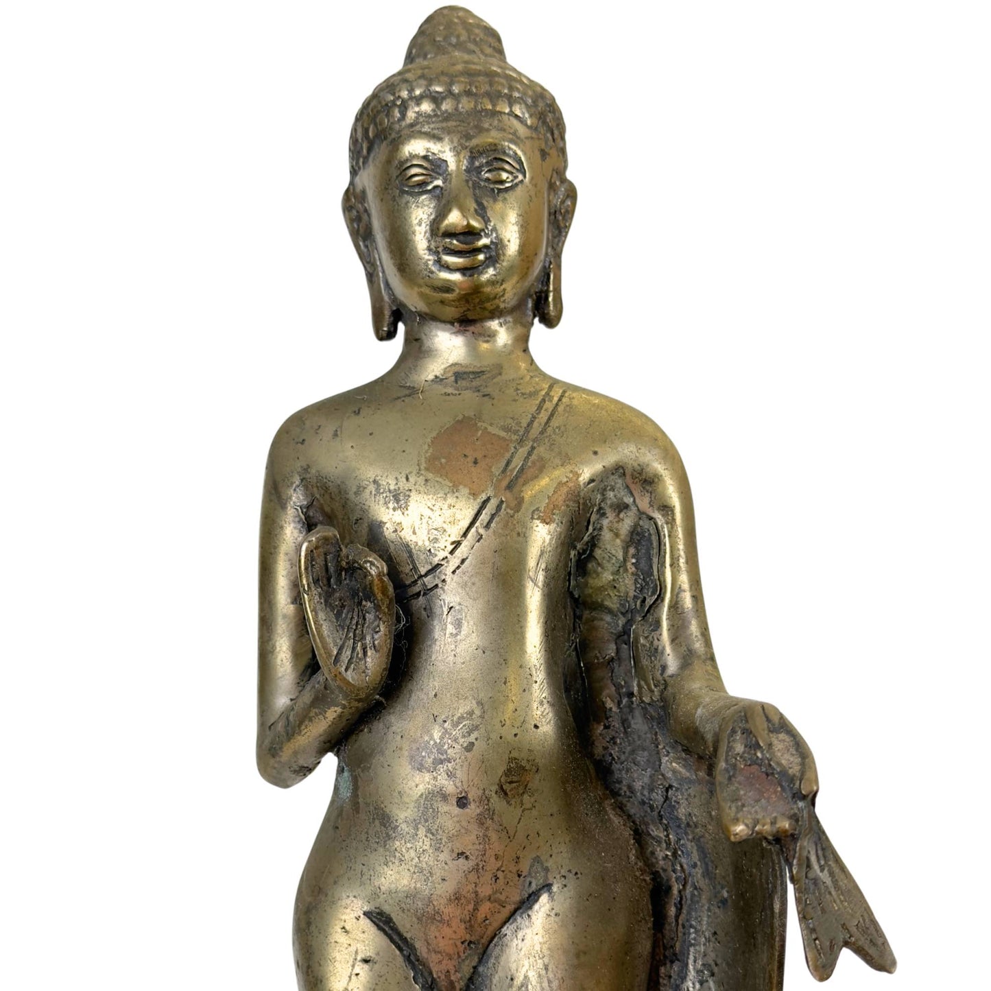 Unique weathered bronze Buddha statue with a distinctive appearance.