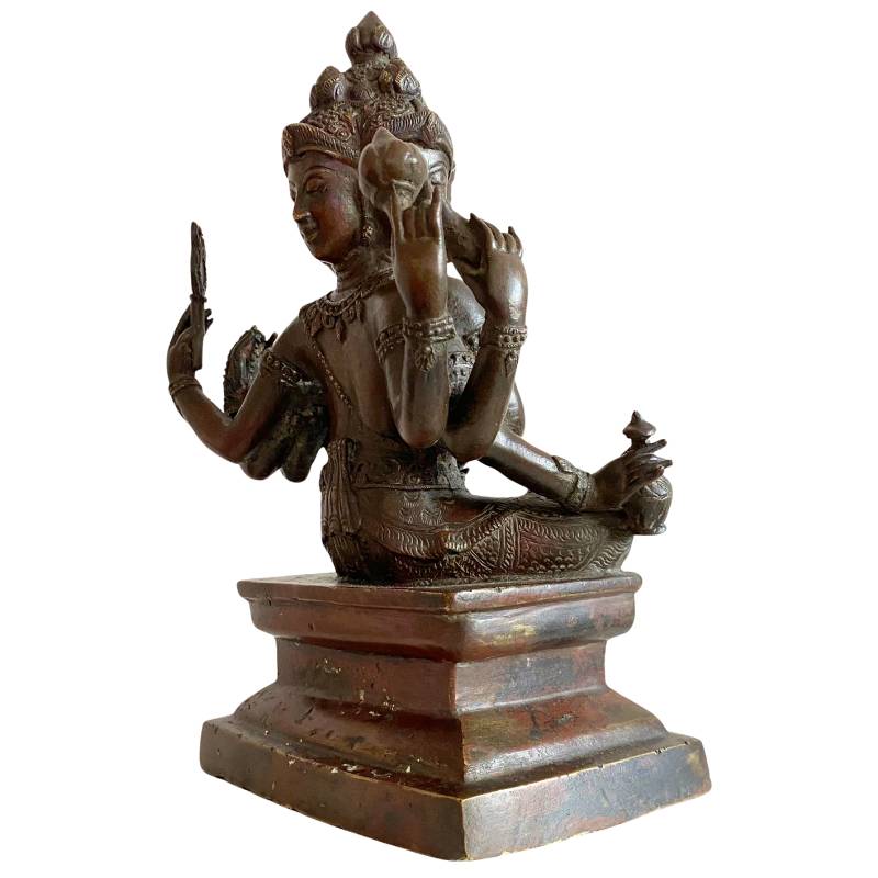 Antique four-headed Brahma sculpture in bronze with natural patina