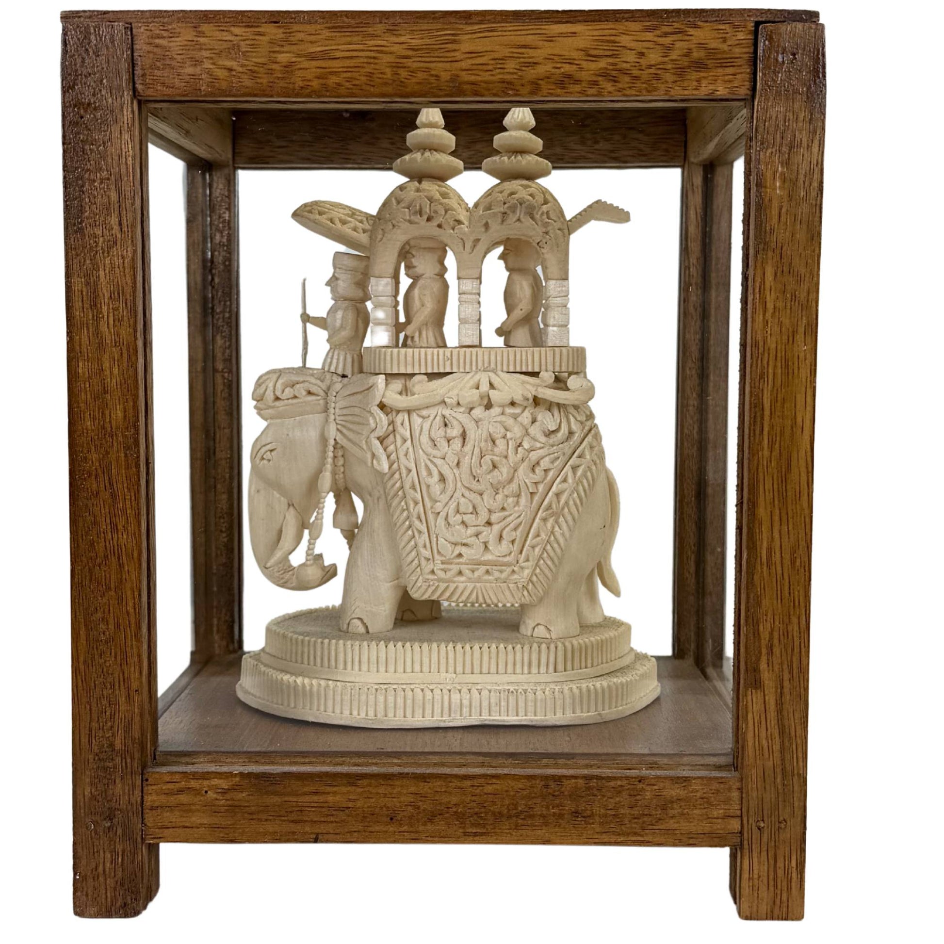 Vintage Indian display case with Sholapith elephant statue