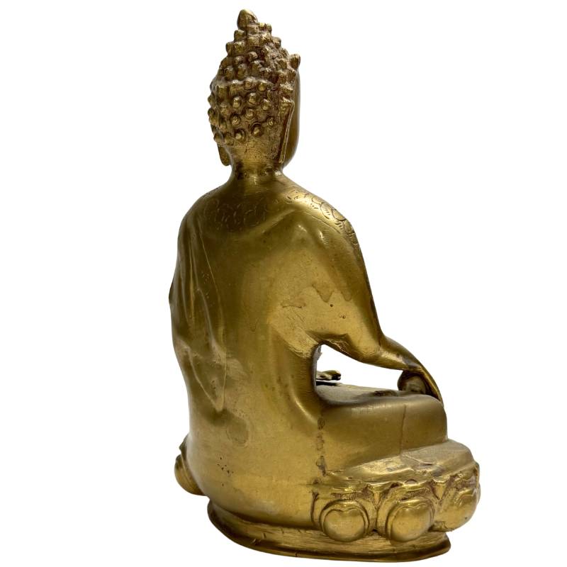Authentic vintage Tibetan bronze Buddha statue of Shakyamuni in a meditation pose.