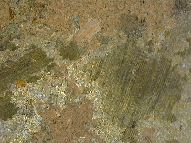 Enlargement of natural corrosion structure without modern coating on Vishnu bust in bronze